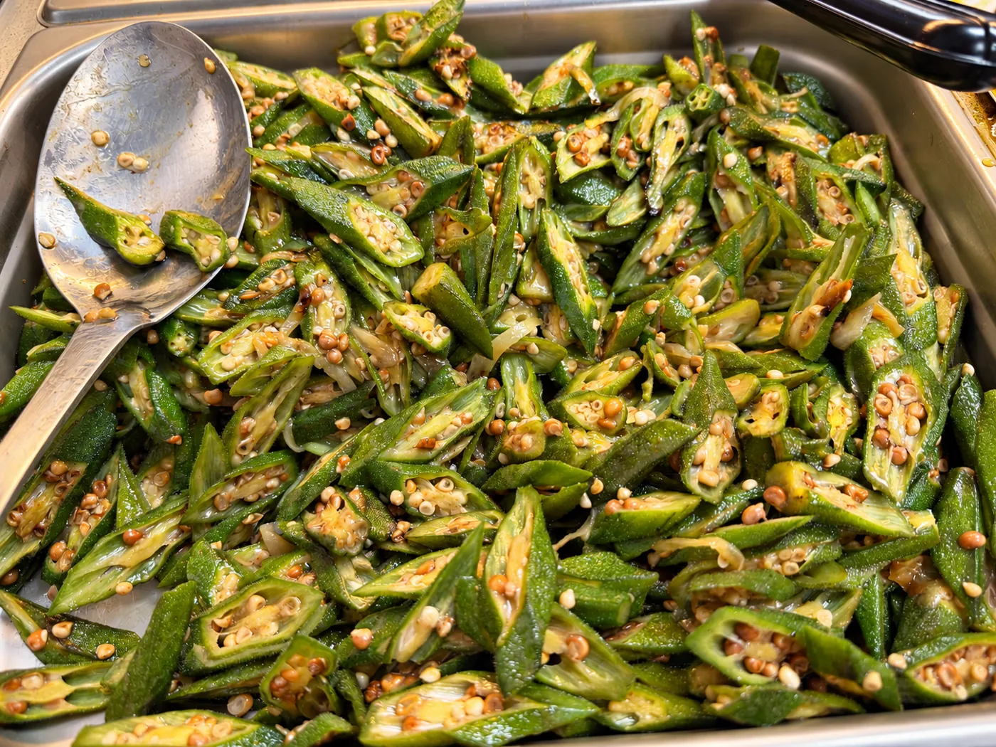 Tray of sliced cooked okra